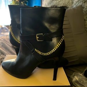 Ralph Lauren ankle boots in black with gold chain.